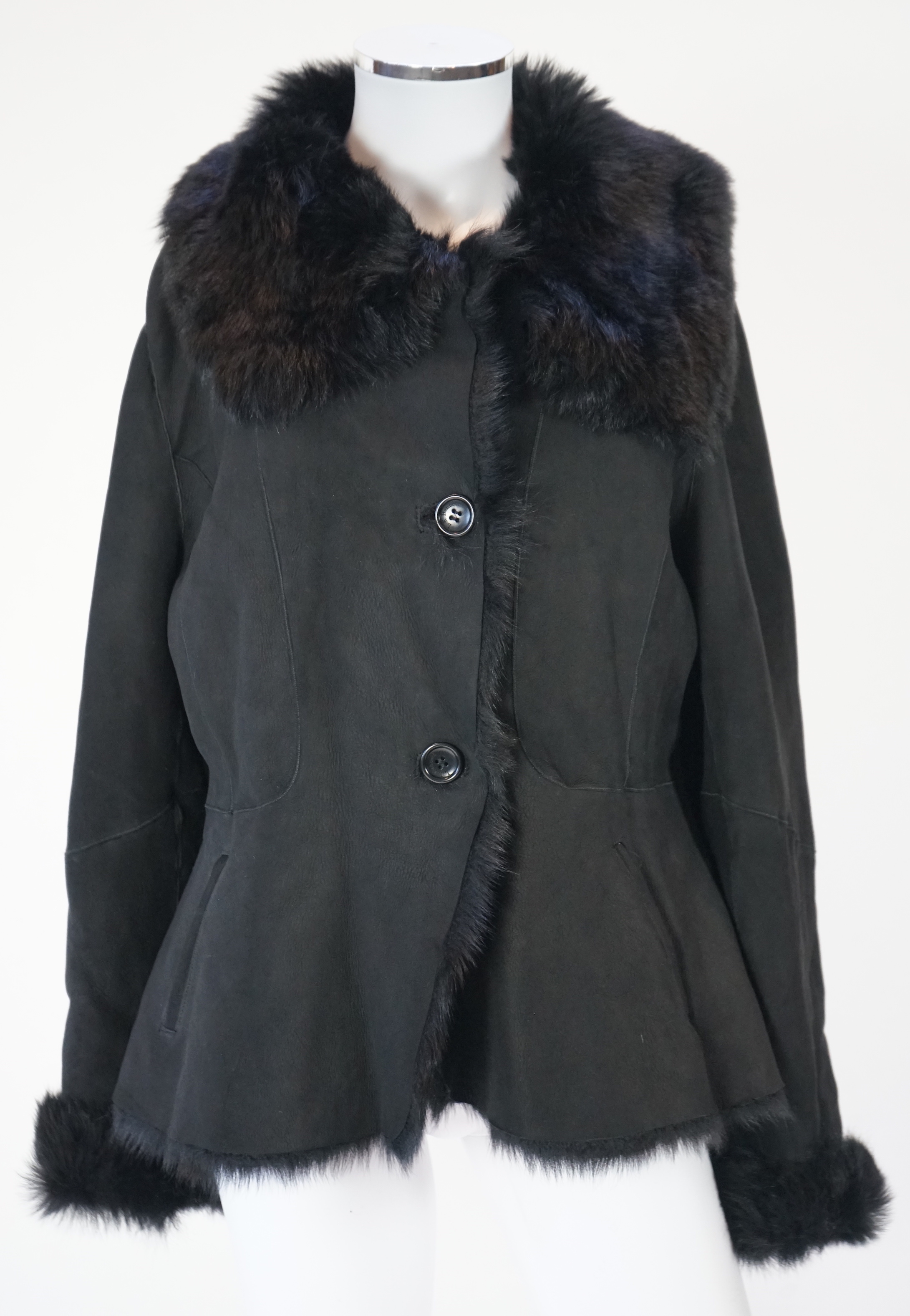 A lady's L K Bennett black shearling jacket, size Large